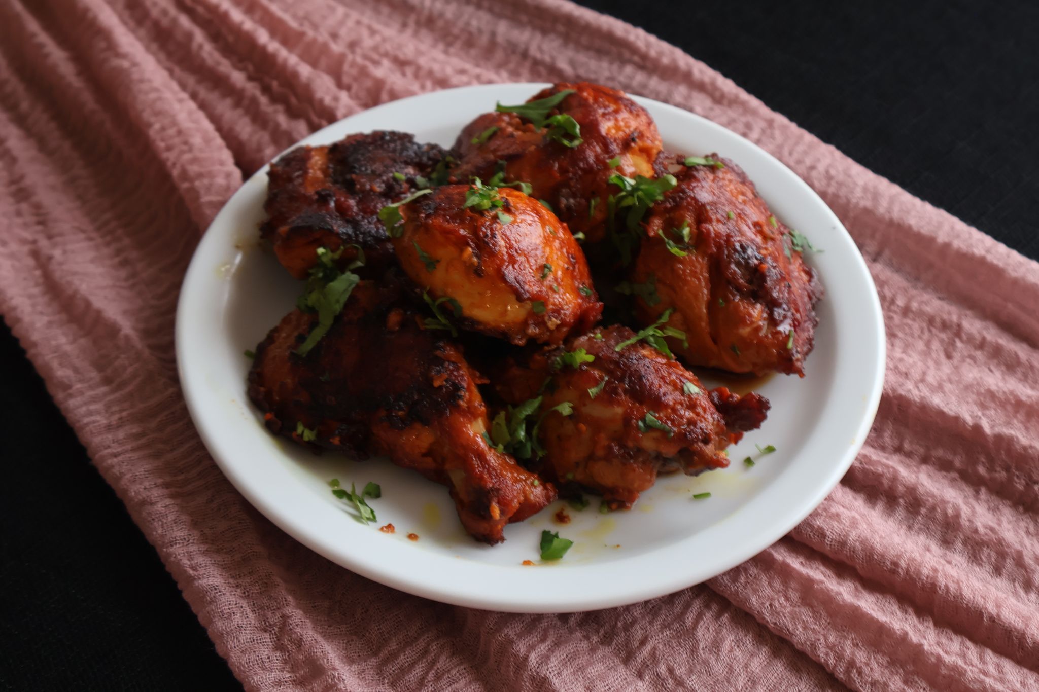 Spiced roasted chicken prepared in Peppercorn Foods kitchen